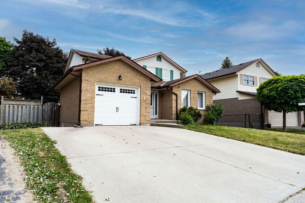 Photo principale - Beautiful 4-Bedroom Home in Pond Mills – Finished Basement & Garage