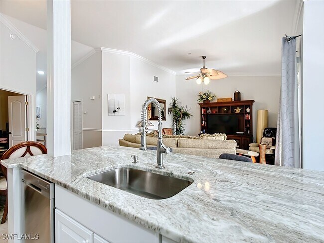 Foto del edificio - 10401 McArthur Palms Ln
