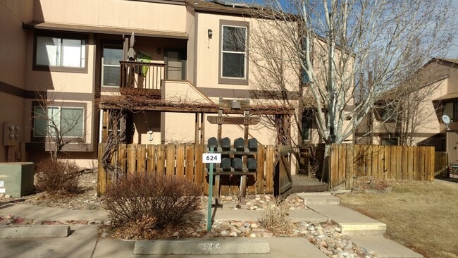 Open gate to garden patio, stairs to upper deck and front door. - 614 Tantra Dr Townhome