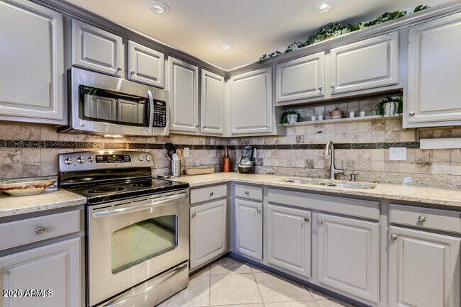 Building Photo - 9455 E Raintree Dr