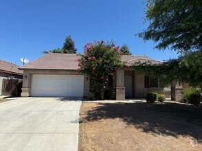 Building Photo - 9318 Manihiki Ave