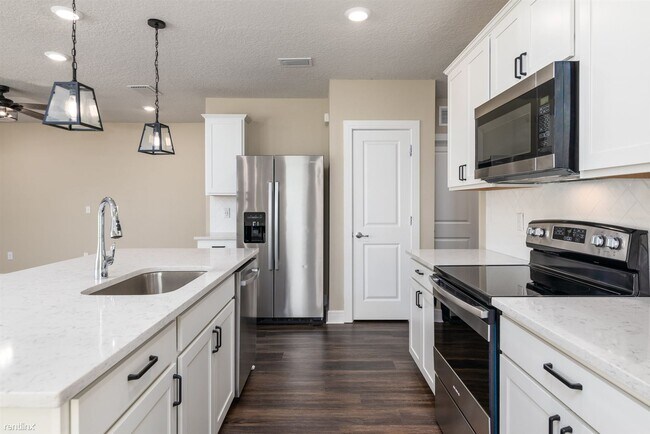 Building Photo - 4 br, 2 bath House - 8933 Royal River Cir