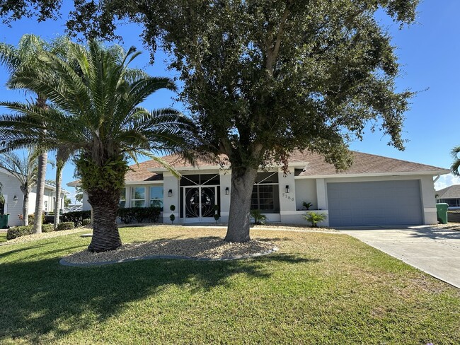 Building Photo - "Spacious 4-Bedroom 2 bathroom pool home"