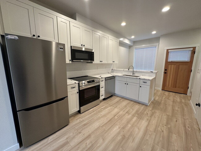 Building Photo - New 2-Bedroom Townhome with Private Back Yard