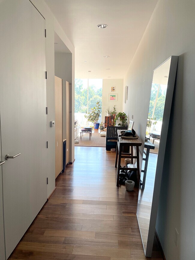 Upon entering, bathroom on the left, hallway to living space - 2530 SE 26th Ave