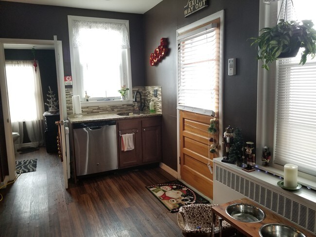 kitchen with door to back porch - 223 W Fairview St