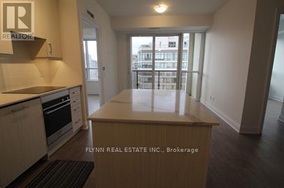 Photo du bâtiment - 36 Elm Dr W