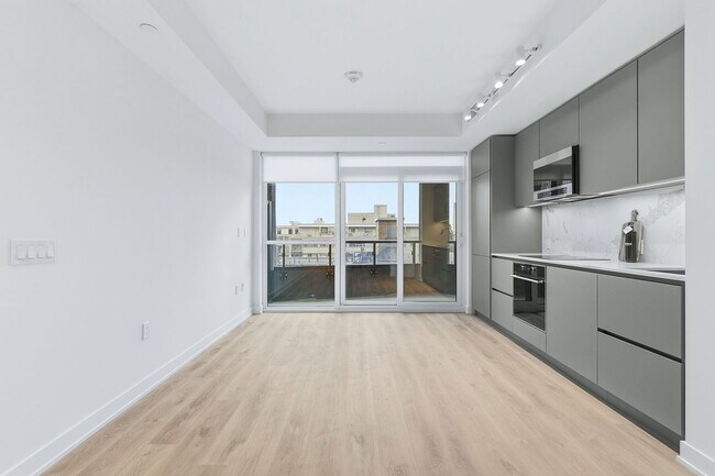 Photo du bâtiment - 110-4110 Broadway Ave