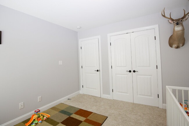 Building Photo - "Spacious 4-Bedroom Gem with 2.5 Baths at ...