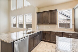 Building Photo - 8714 Windsong Trail Dr