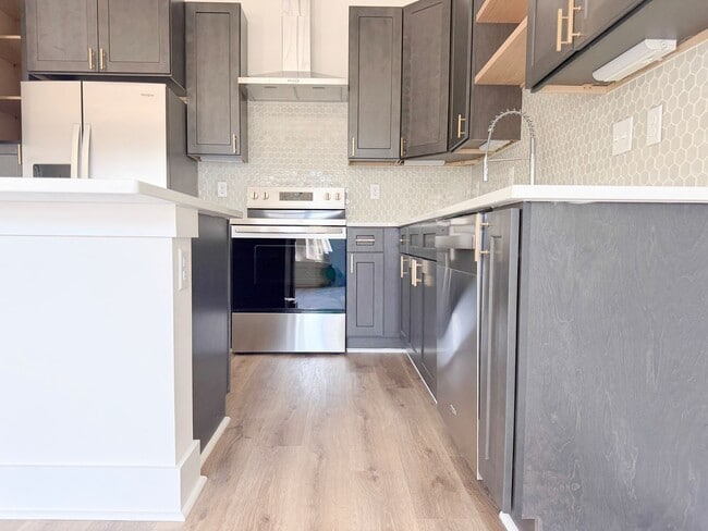 Building Photo - Fuller Style - Spacious 2-Bedroom Townhome with Flex Room at Highbury