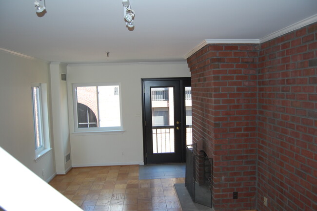 Living/Dining Area w/Wood Burning Fireplace - 1068 Paper Mill Ct NW