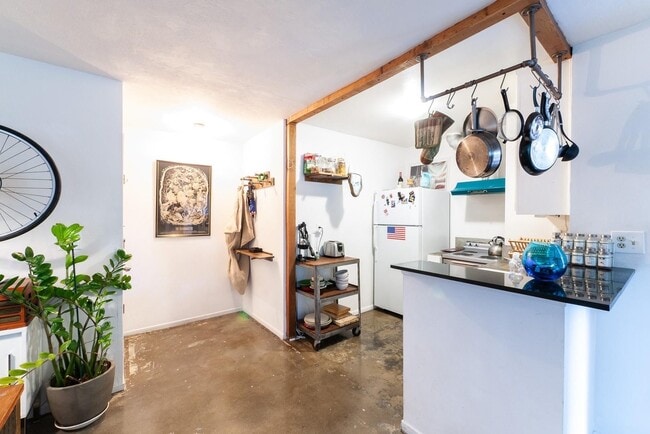 Photo - Bright, spacious, modern 1 bdrm + 1 bath condo w/polished cement floors, AC, 1 car parking