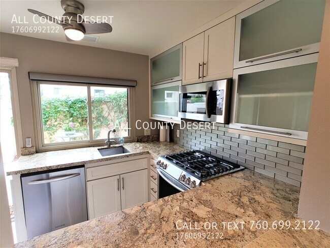 Building Photo - 48822 Desert Flower Dr