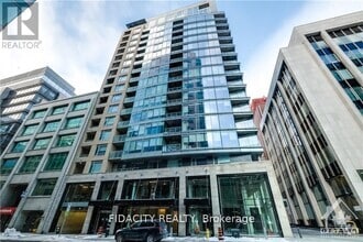 Building Photo - 101-1101 Queen St