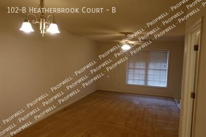 Building Photo - 102-B Heatherbrook Court-B