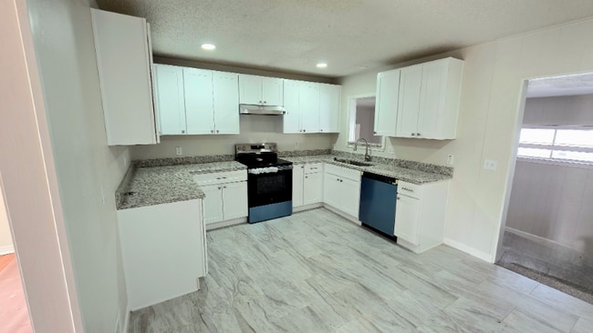 Building Photo - 8241 Norvell Dr