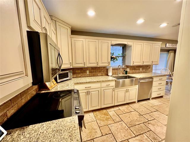 Foto del edificio - 7812 Woodharbor Dr