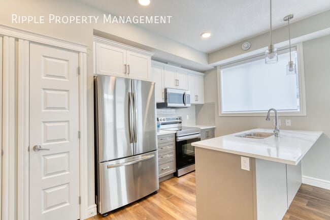 Building Photo - COZY 1 BED/ 1 BATH TOWNHOUSE IN THE COMMUNITY OF SADDLE RIDGE