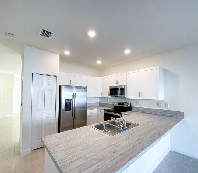 Foto del edificio - 10402 W 33rd Ct