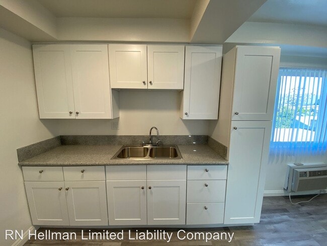 Building Photo - 7559 Hellman Ave