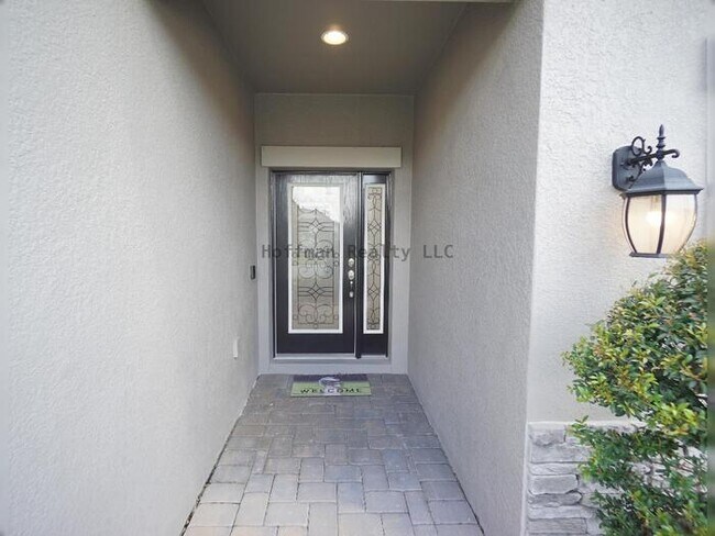 Building Photo - 7076 Gulf Cypress Ave