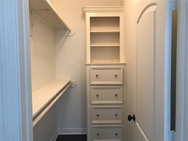 Close space with built in shelves and drawers - 3411 Oakdale Street #A