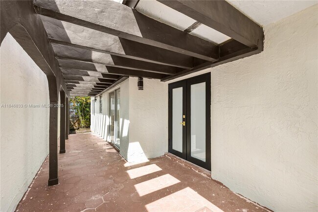 Building Photo - 3860 W 10th Ct