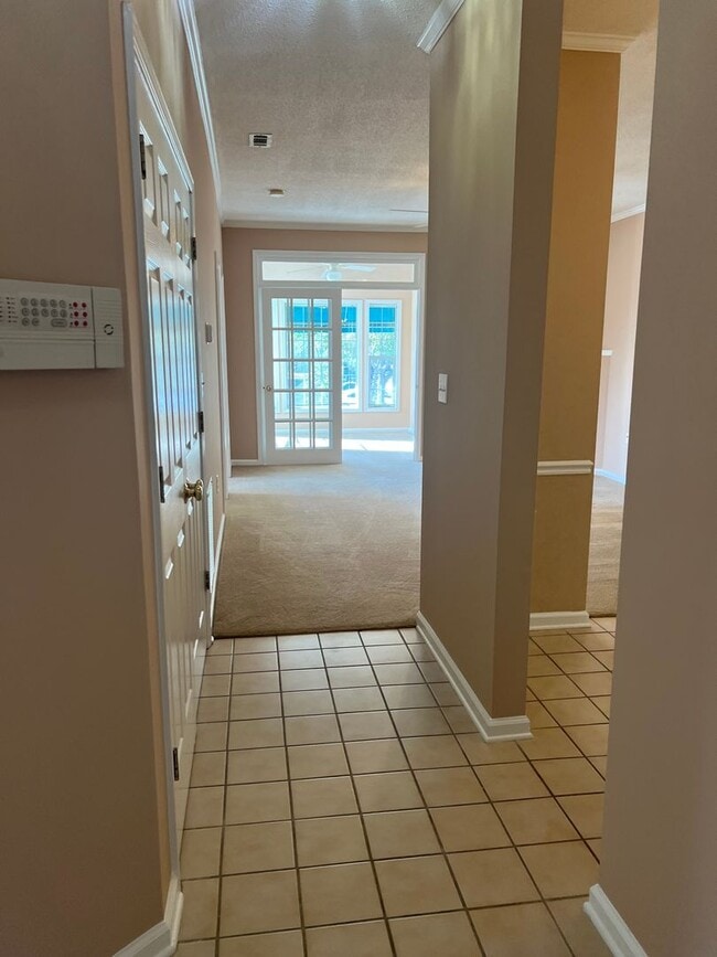 Building Photo - Beautiful Condo in Gated Community! Resort Style Amenities, Walk to beach, Awesome Myrtle Beach L...