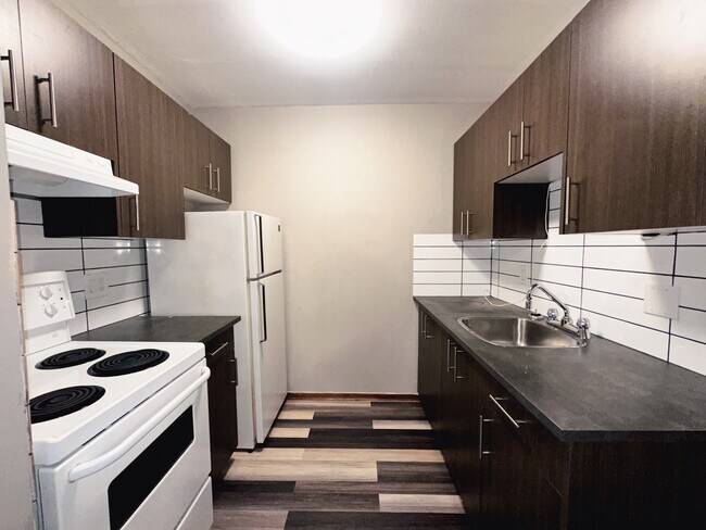 Photo du bâtiment - 424 Rue Aulneau