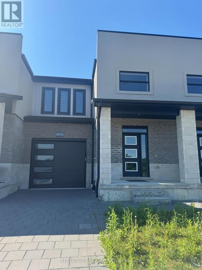 Building Photo - 6945 Royal Magnolia Ave