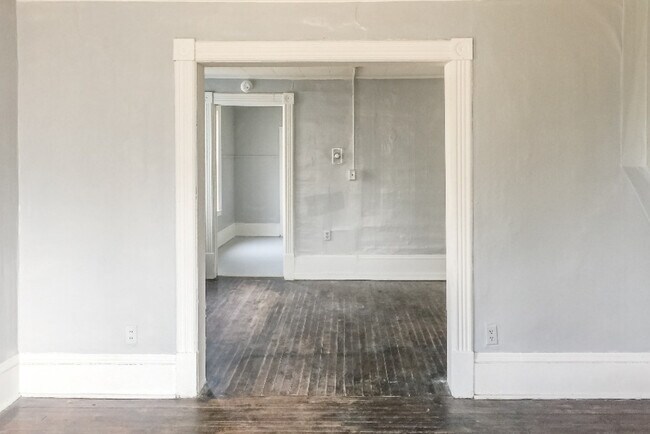 Front room looking into apartment. - 322 Beaser Ave
