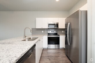 1BR, 1BA - 699SF - Kitchen - Cottages at Woodmen Heights