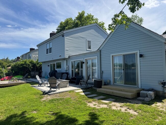 Building Photo - Lake Front Living-Four Bedroom Three and a...