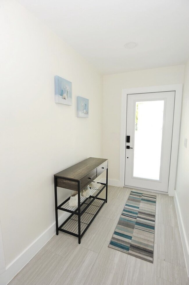 Building Photo - ANNUAL RENTAL Naples Park 3 Bedroom // 2 Bathroom Single Family Home
