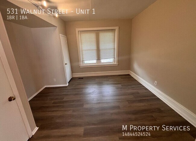 Building Photo - Charming Renovated 1-Bedroom First floor T...