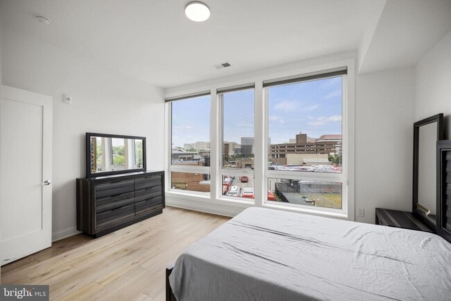 Building Photo - AVAILABLE NOW! Penthouse living in the hea...