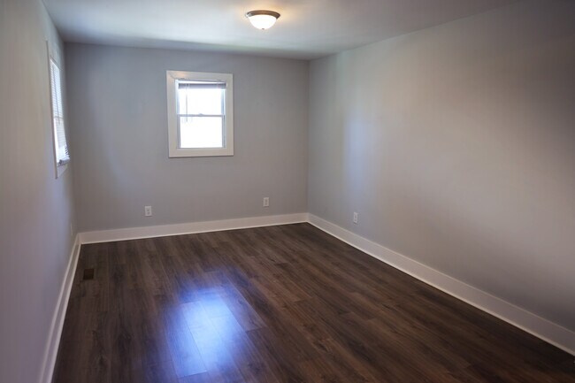 Living Room is spacious, windows on 3 sides - 1609 11th Ave N