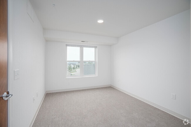 2BR,2BA - Primary Bedroom - Carver Place