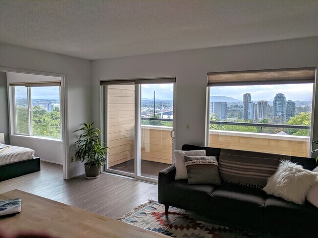 Windows, the length of the apartment. - 3701 SW Condor Ave
