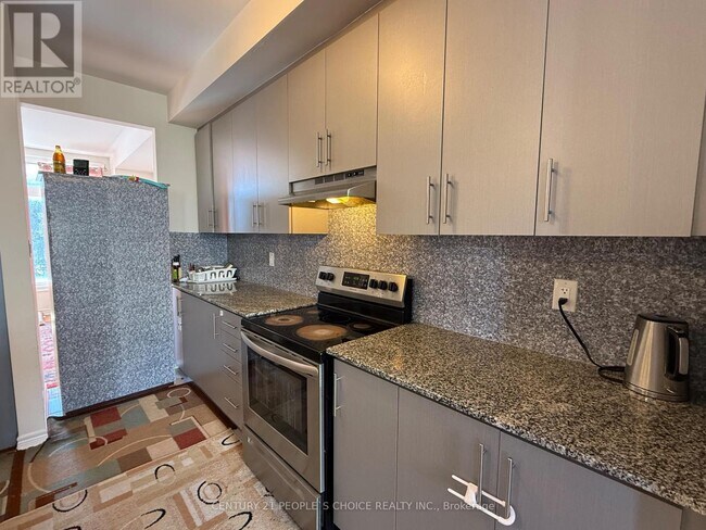 Photo du bâtiment - 22 Queenpost Dr