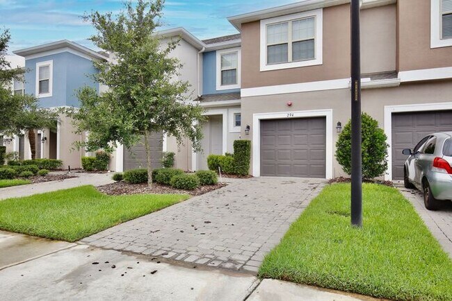 Building Photo - Gorgeous 3/2.5 Modern Townhome with 1 Car ...