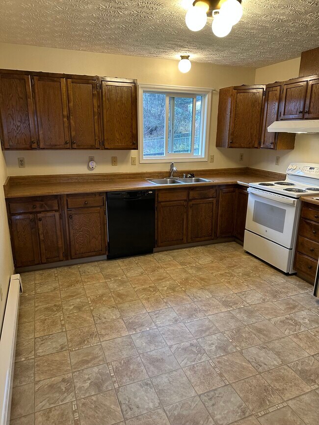 Foto del edificio - 6511 E 8th Ave