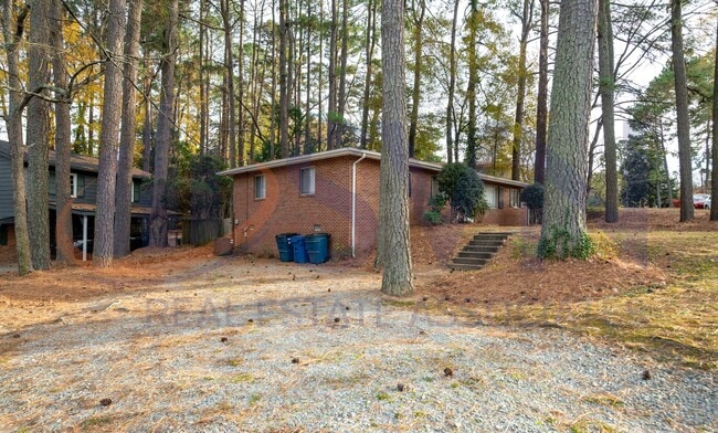 Building Photo - Charming Brick Ranch on a Spacious, Wooded Lot!