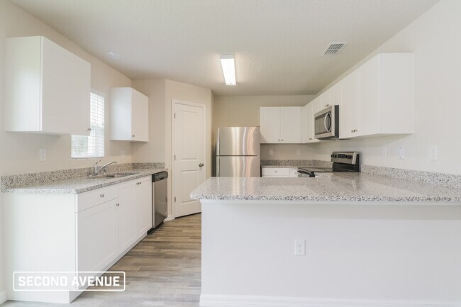 Building Photo - 6690 N Roland Dr