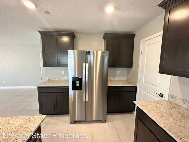 Building Photo - 4 br, 3 bath House - 6972 Caldera St