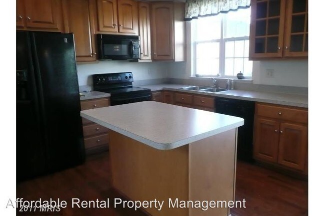 Building Photo - 4 br, 2.5 bath House - 17524 Patterson Dr