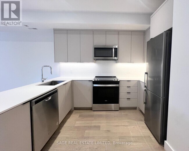 Photo du bâtiment - 909 Castlefield Ave