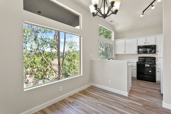 Building Photo - Beautiful End Unit Condo with Overlook of ...