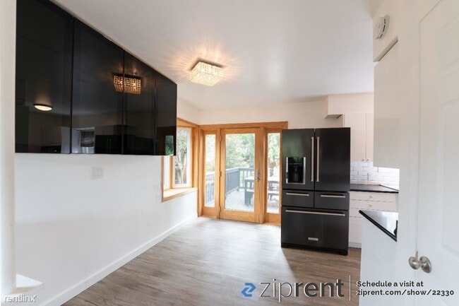 Building Photo - 4 br, 2 bath House - 10427 63rd Ave S, Sea...